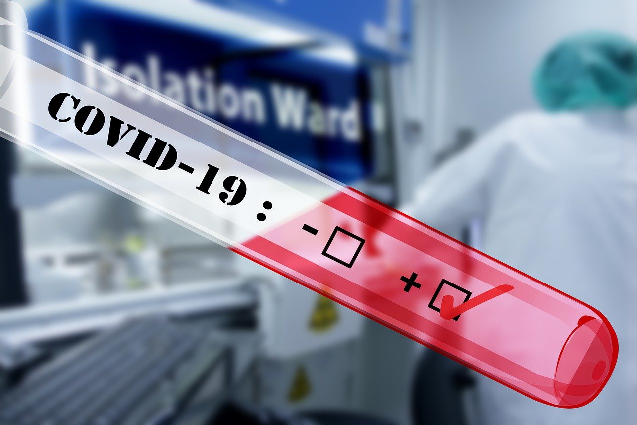 Picture of a test tube with Covid-19 written on it